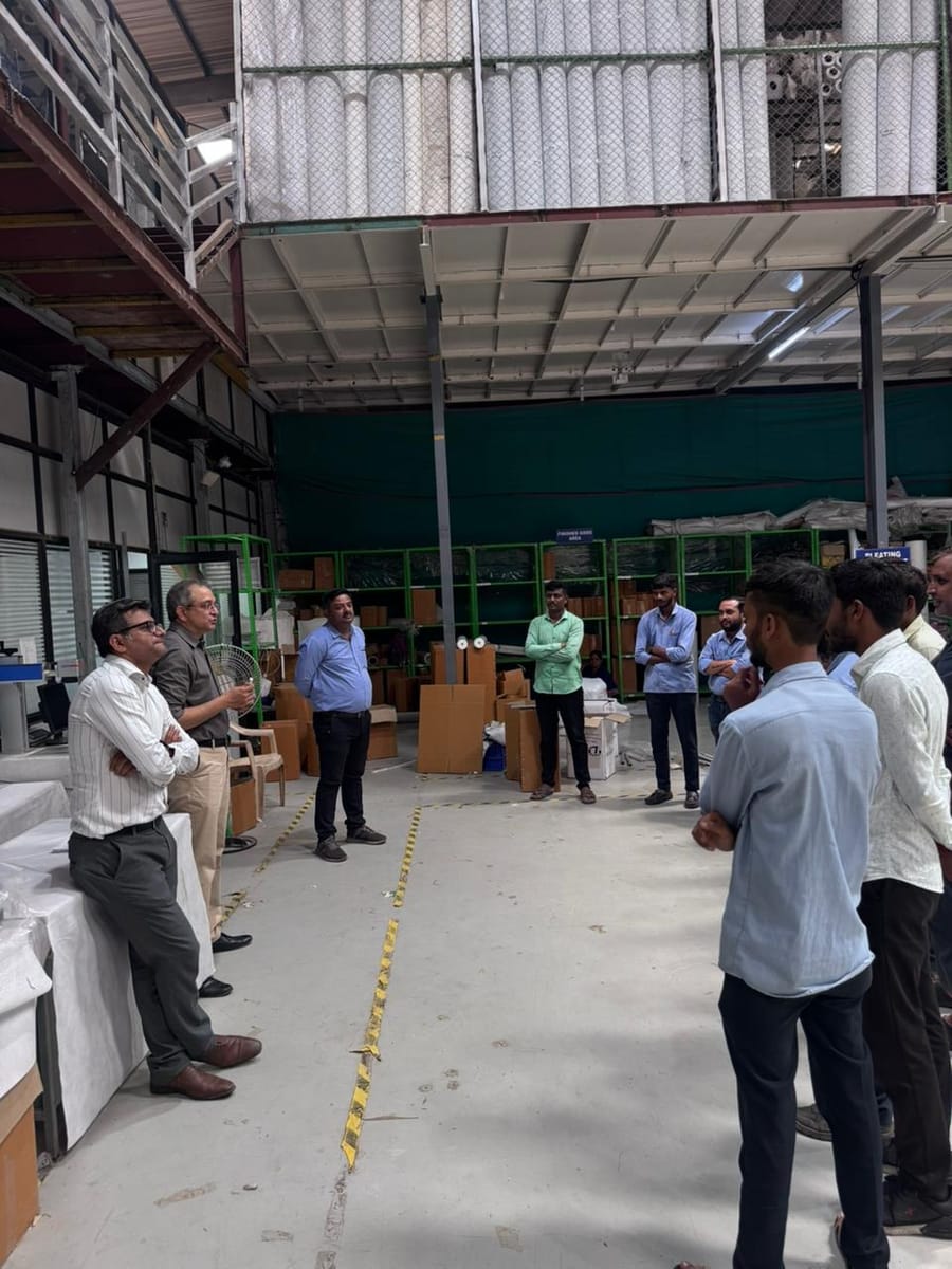 Gopal Kamath addressing a team on a factory shop floor